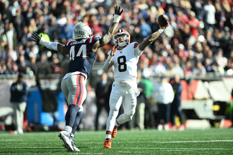 Oct 26, 2025; Foxborough, Massachusetts, USA; Cleveland Browns quarterback Dillon Gabriel (8) throws the ball defended by New England Patriots linebacker K'Lavon Chaisson (44) during the second quarter at Gillette Stadium.