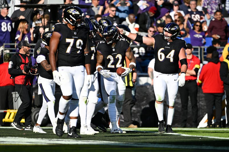 Oct 26, 2025; Baltimore, Maryland, USA; Baltimore Ravens running back Derrick Henry (22) celebrates with Baltimore Ravens center Tyler Linderbaum (64) after scoring a touchdown during the fourth quarter against the Chicago Bears at M&T Bank Stadium.