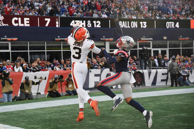 Oct 26, 2025; Foxborough, Massachusetts, USA; Cleveland Browns wide receiver Jerry Jeudy (3) reaches for a pass against New England Patriots cornerback Christian Gonzalez (0) during the fourth quarter at Gillette Stadium. Mandatory Credit: Bob DeChiara-Imagn Images