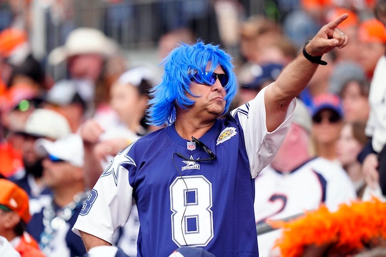  Dallas Cowboys fan reacts in the first half against the Denver Broncos at Empower Field at Mile High.