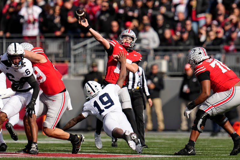 Ohio State Buckeyes quarterback Julian Sayin (10) throws a long touchdown pass to Carnell Tate during the NCAA football game against the Penn State Nittany Lions at Ohio Stadium in Columbus on Nov. 1, 2025.