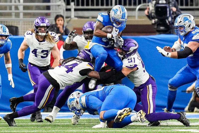 Detroit Lions running back Jahmyr Gibbs (0) was almost totally bottled up by the Minnesota Vikings at Ford Field in Detroit on Sunday, November 2, 2025.