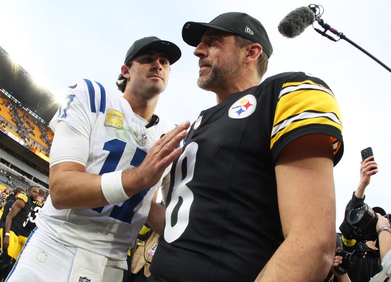 Nov 2, 2025; Pittsburgh, Pennsylvania, USA; Pittsburgh Steelers quarterback Aaron Rodgers (8) and Indianapolis Colts quarterback Daniel Jones (17) shake hands after the game at Acrisure Stadium.