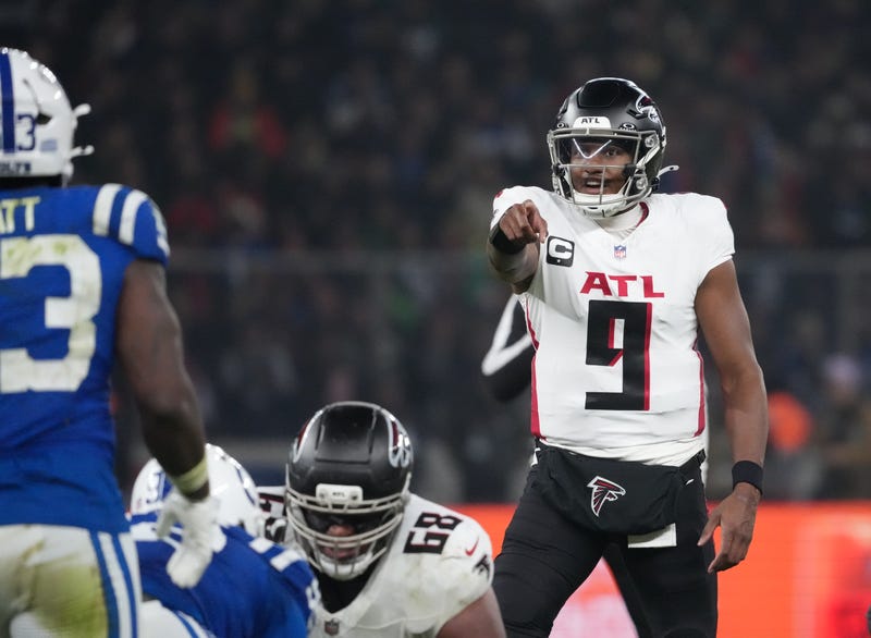 Atlanta Falcons quarterback Michael Penix Jr. (9) gestures before the snap against the Indianapolis Colts during the NFL Berlin Game at Olympic Stadium.