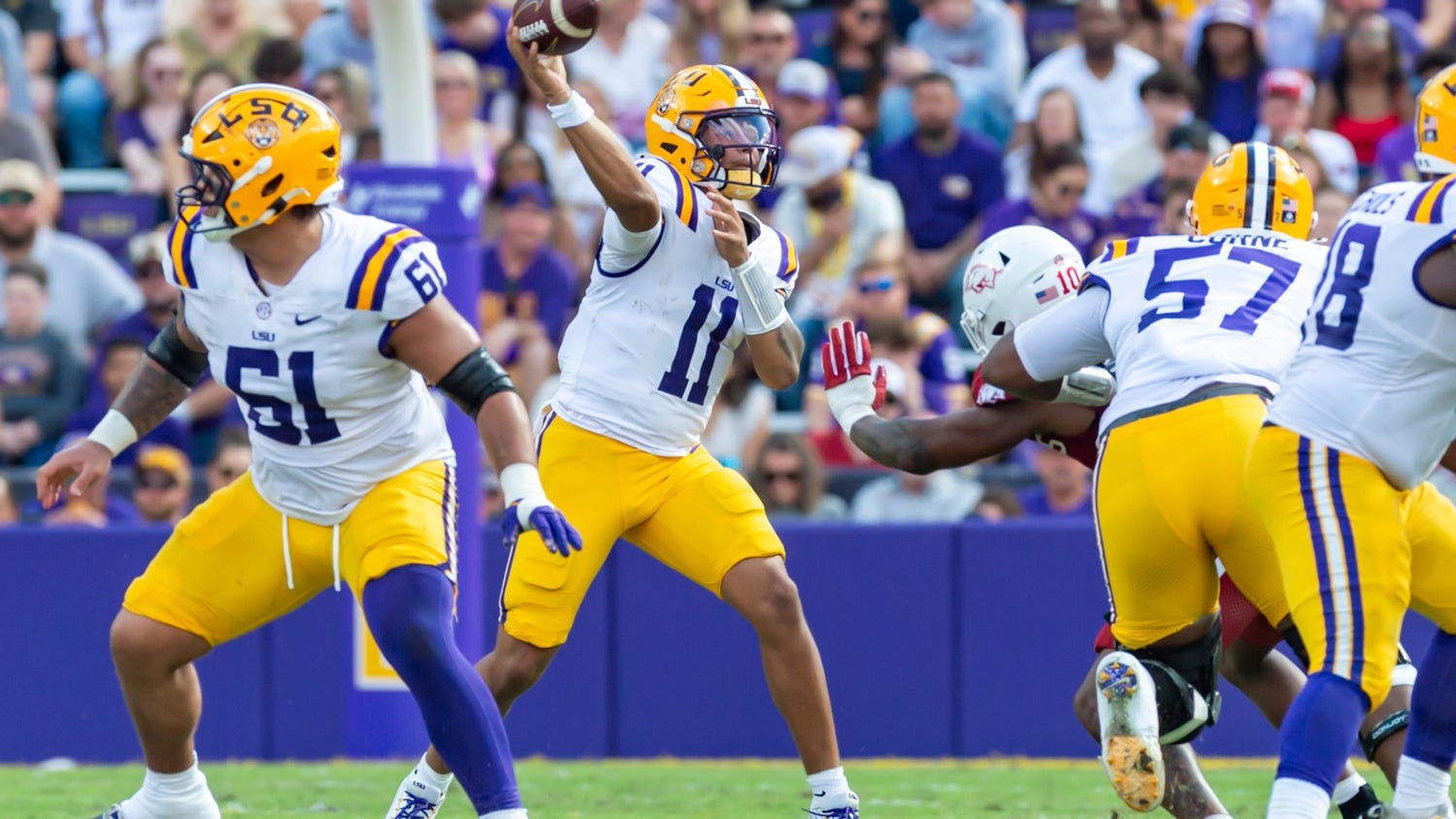LSU football rallies to beat Arkansas for first win under interim HC