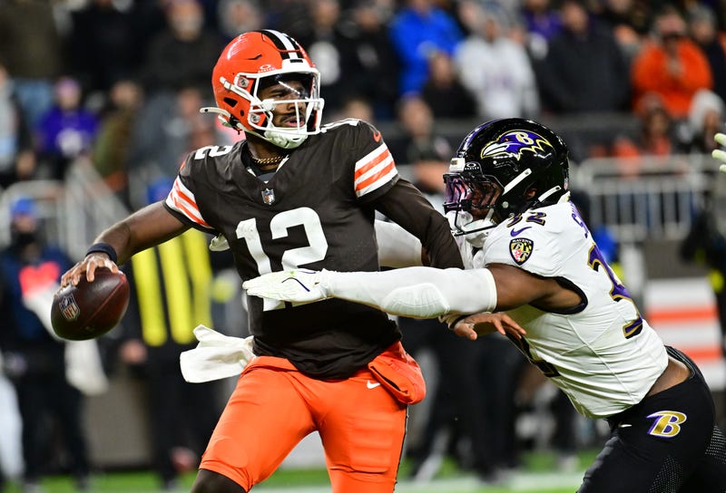 Nov 16, 2025; Cleveland, Ohio, USA; Cleveland Browns quarterback Shedeur Sanders (12) is sacked by Baltimore Ravens linebacker Trenton Simpson (32) during the fourth quarter at Huntington Bank Field. Mandatory Credit: Ken Blaze-Imagn Images