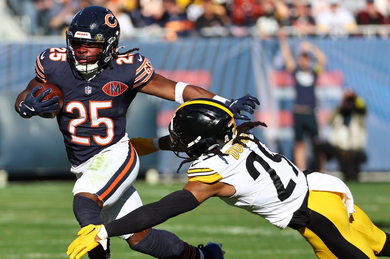 Kyle Dugger trying to make a tackle vs Chicago