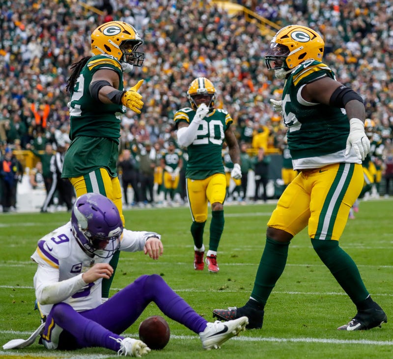 Green Bay Packers defensive tackle Devonte Wyatt (95) celebrates with defensive end Rashan Gary (52) after sacking Minnesota Vikings quarterback J.J. McCarthy (9) on Sunday, November 23, 2025, at Lambeau Field in Green Bay, Wis. The Packers won the game, 23-6. 