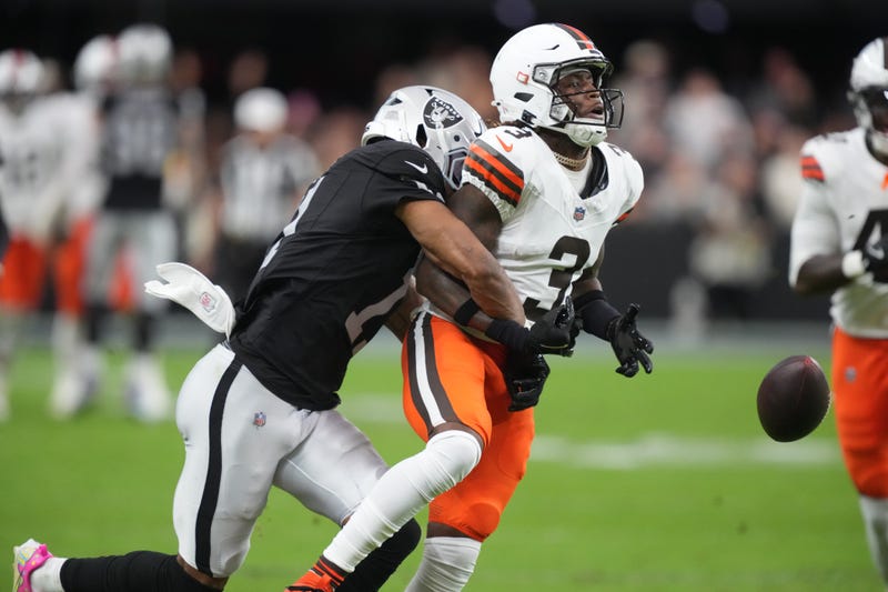 Nov 23, 2025; Paradise, Nevada, USA; Las Vegas Raiders safety Jeremy Chinn (11) tackles Cleveland Browns wide receiver Jerry Jeudy (3) in the first half at Allegiant Stadium.