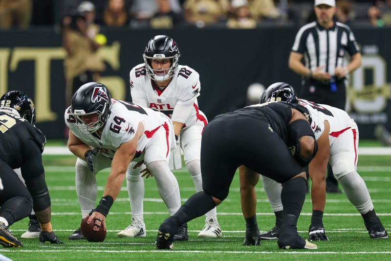 Nov 23, 2025; New Orleans, Louisiana, USA; Atlanta Falcons quarterback Kirk Cousins (18) under center during the first half against the New Orleans Saints at Caesars Superdome. Mandatory Credit: Stephen Lew-Imagn Images
