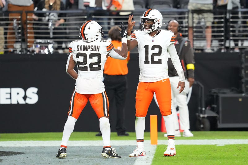 Cleveland Browns quarterback Shedeur Sanders (12) celebrates with running back Dylan Sampson (22) after the two connected for a passing touchdown against the Las Vegas Raiders during the fourth quarter at Allegiant Stadium