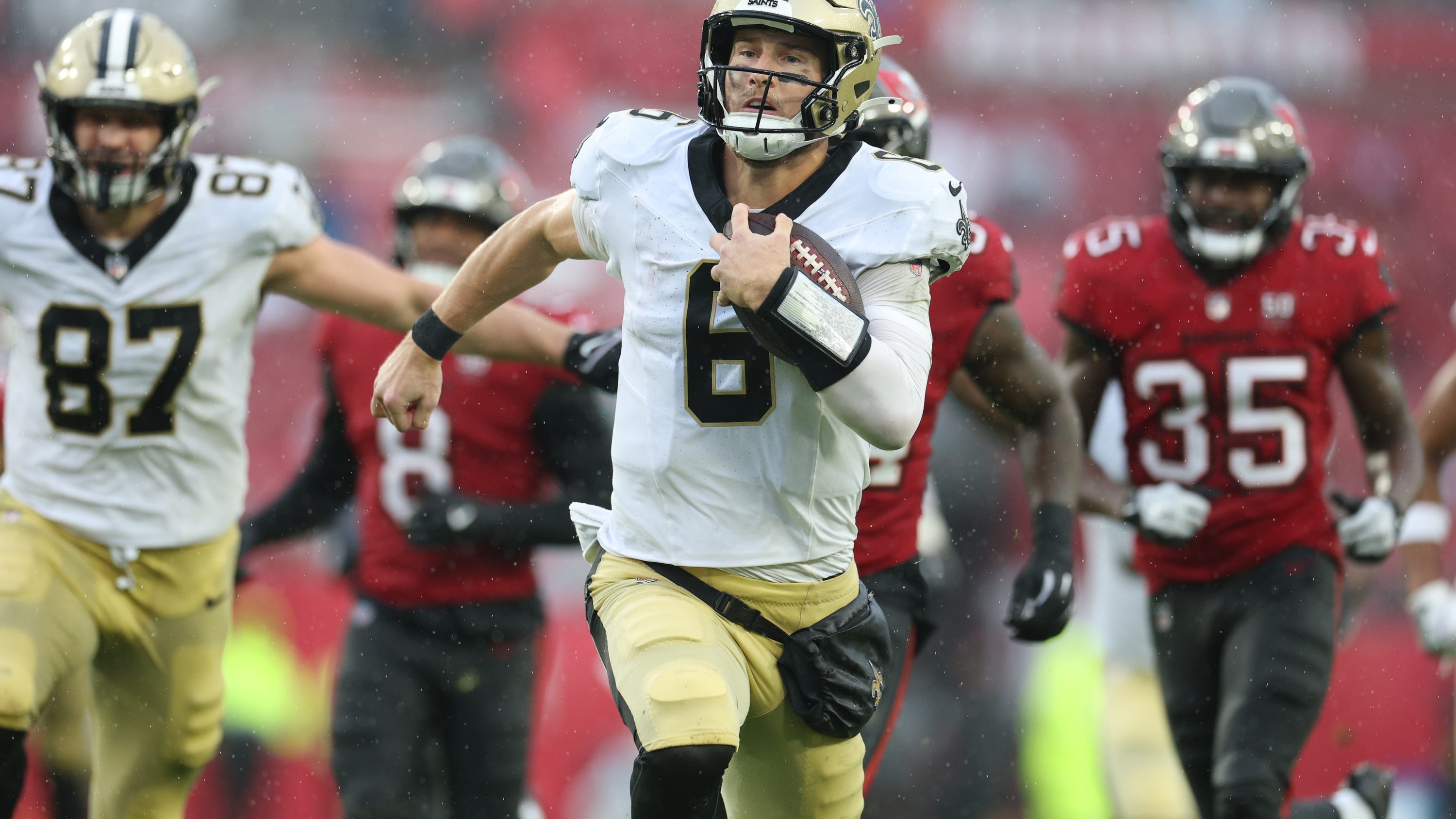 Tyler Shough's two TD runs spur Saints to upset of Bucs in rainy Tampa; here's how it happened