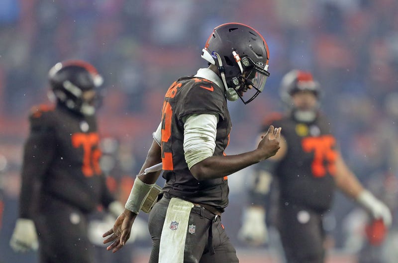 Cleveland Browns quarterback Shedeur Sanders (12) hangs his head as he comes off the field after failing on a two-point conversion attempt during the second half of an NFL football game at Huntington Bank Field, Dec. 7, 2025, in Cleveland, Ohio.