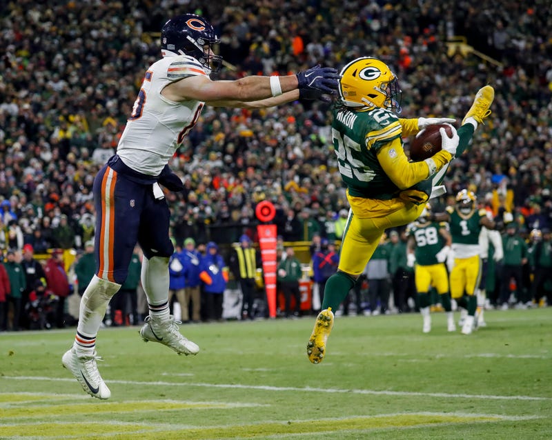  Packers cornerback Keisean Nixon (25) intercepts a pass intended for Chicago Bears tight end Cole Kmet (85) in the end zone to seal a victory on Sunday, December 7, 2025