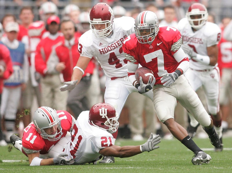 Ohio State's Ted Ginn Jr. , 7, out runs the last Indiana defensive player, Tracy Porter, 36, as he jumps into the end zone in the first half of their game at The Ohio Stadium Stadium, October 23, 2004.
