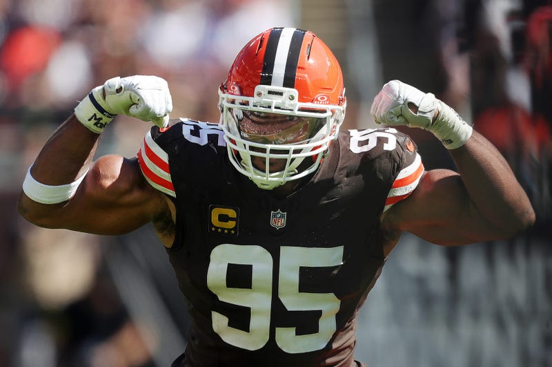 Cleveland Browns defensive end Myles Garrett (95) celebrates as he begins his chase for the NFL sack record after sacking Cincinnati Bengals quarterback Joe Burrow (9) during the second half of an NFL football game at Huntington Bank Field, Sept. 7, 2025, in Cleveland, Ohio.