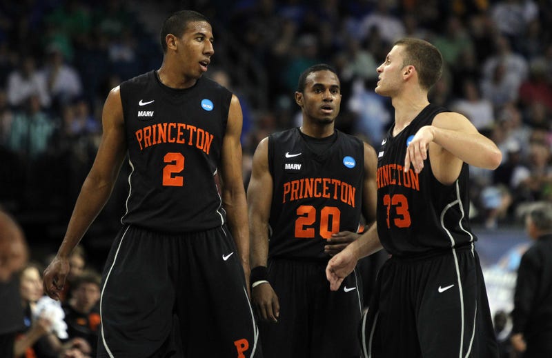 Tampa, FL, USA; Princeton Tigers guard Dan Mavraides (33), guard Douglas Davis (20) and forward Kareem Maddox (2) in the first half against the Kentucky Wildcats during the second round of the 2011 NCAA men's basketball tournament
