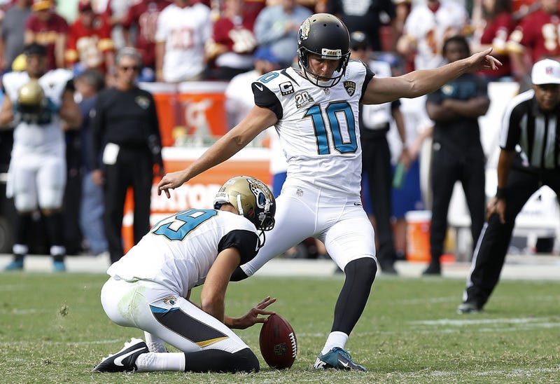 Sep 14, 2014; Landover, MD, USA; Jacksonville Jaguars kicker Josh Scobee (10) attempts a field goal against the Washington Redskins at FedEx Field.