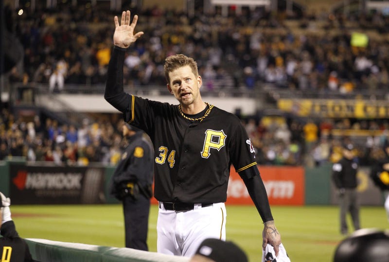 Pittsburgh Pirates starting pitcher A.J. Burnett (34) reacts to the crowd as he takes a curtain call