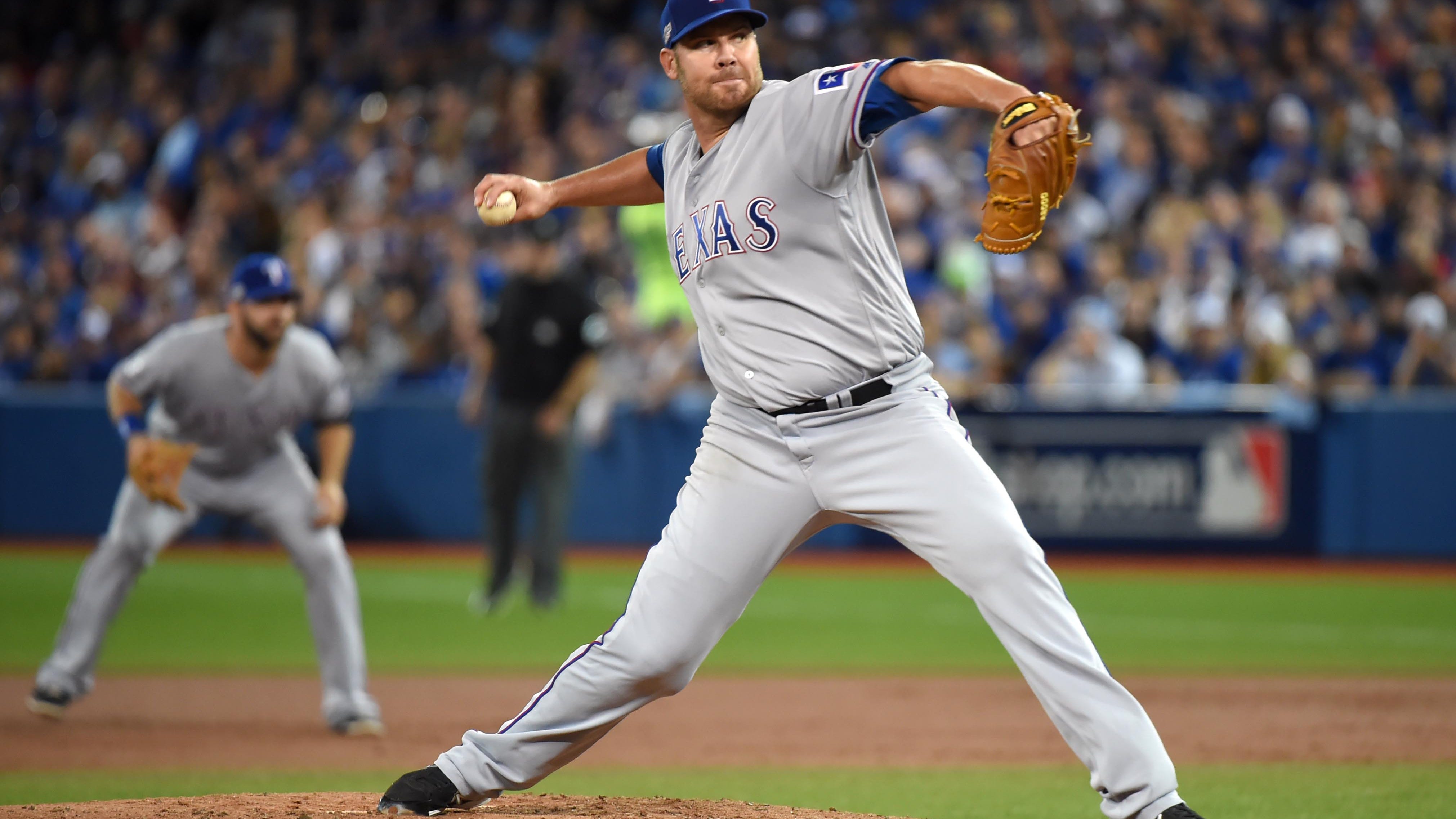 Colby Lewis on the Rangers rotation, dealing with umpires, WS memories