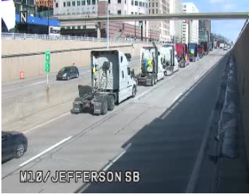 Convoy of trucks with Ukrainian flags in Detroit