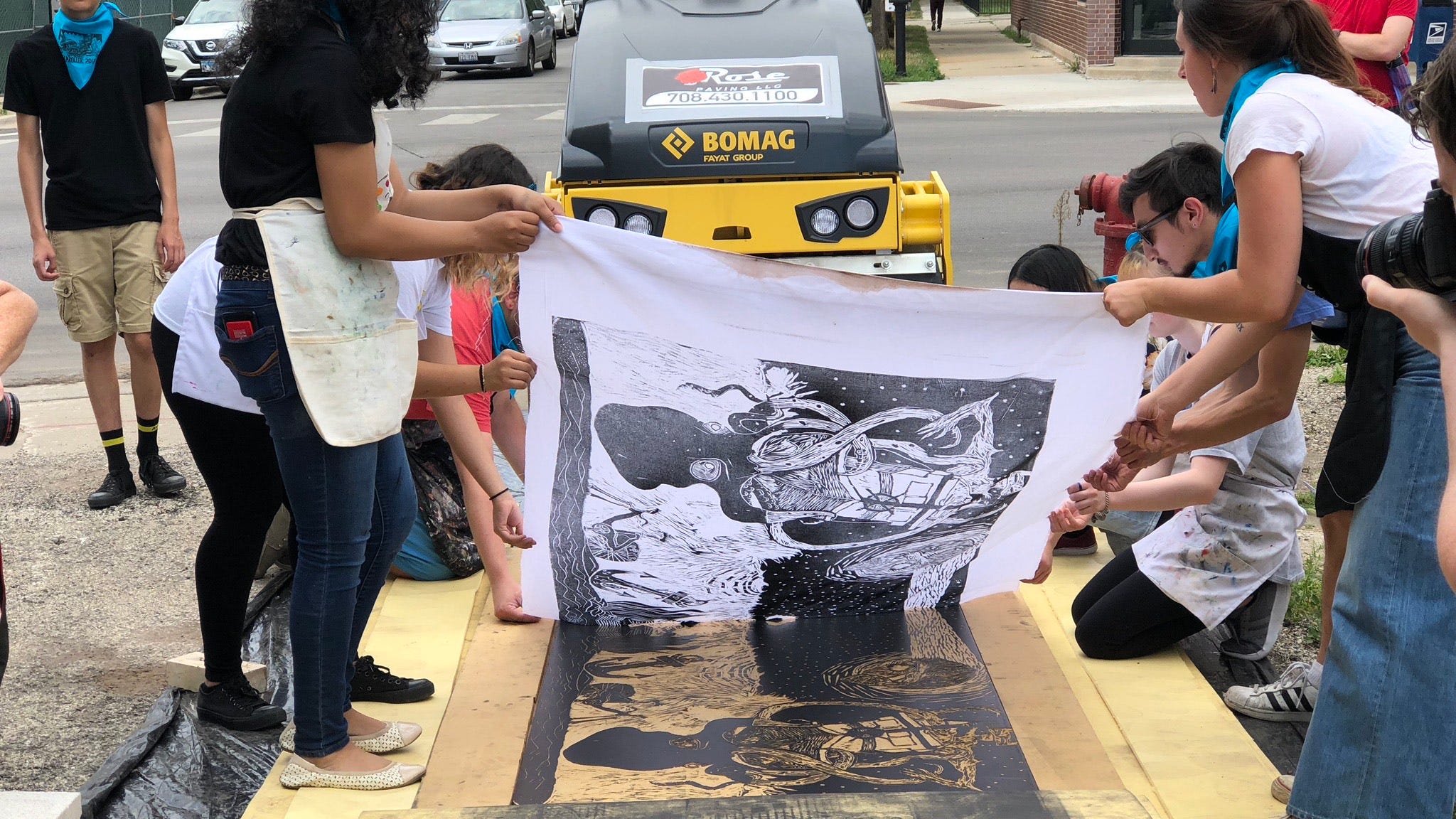 How to make giant wood block prints? With a steamroller, of course