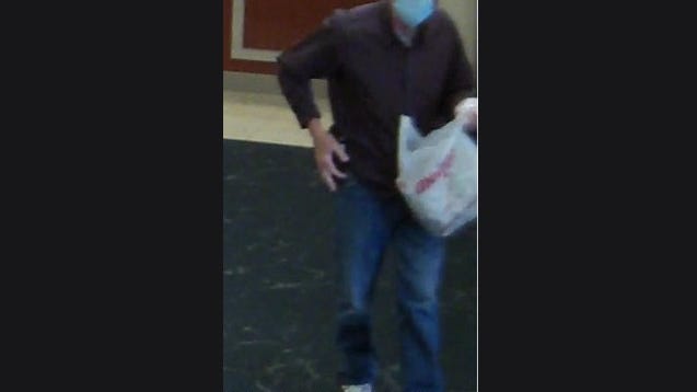 Bank robber wanted for holding up Fifth Third Bank in Ann Arbor