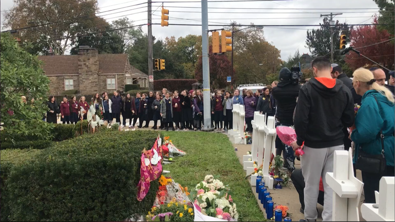 people gathering after Tree of Life shooting