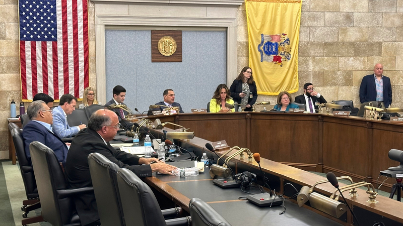 The Democrat-led New Jersey Senate Budget Committee, headed by chairman Paul Sarlo, center, begins taking a roll call vote on the state’s fiscal year 2025 budget, Wednesday, June 26, 2024, in Trenton, N.J.