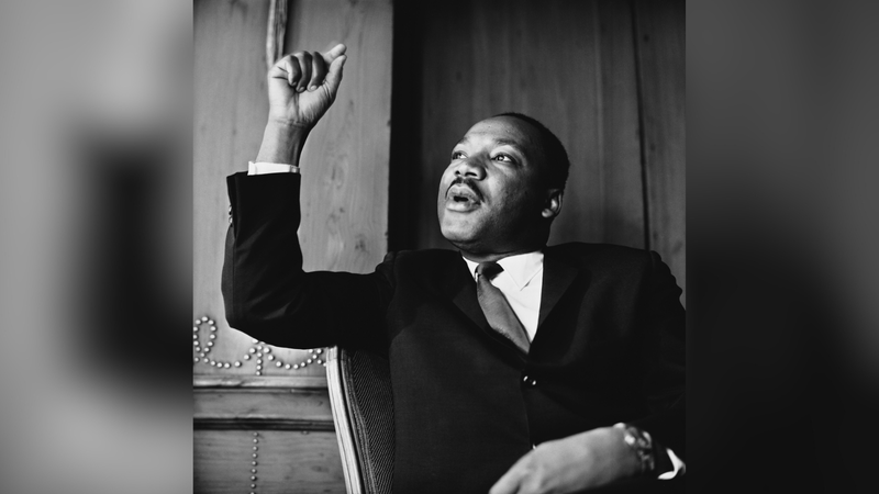 Martin Luther King, Jr (1929 - 1968) at a press conference in London, September 1964.