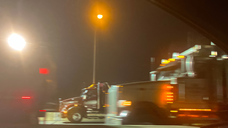 Construction trucks working on I-76 West Friday, March 28, 2025 around 10:30 p.m.
