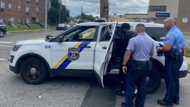 Rasheen Trusty being taken into custody on Tuesday, Aug. 8, 2023.