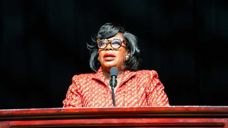 Mayor Cherelle Parker speaks at a podium 