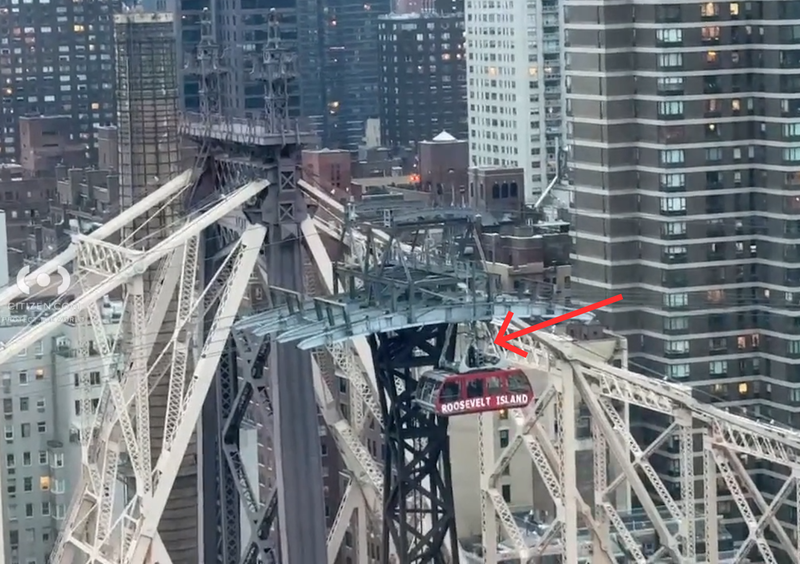 The man climbed the tower and was atop the tramcar at one point