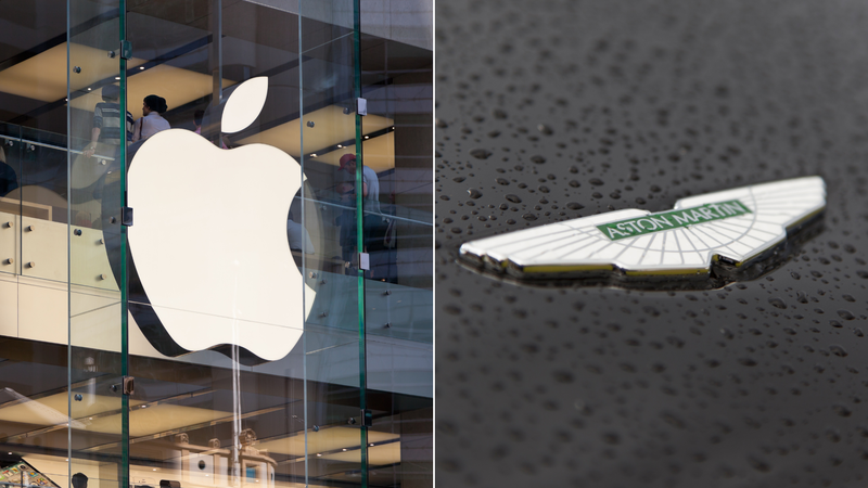 Apple sign on left, Aston Martin emblem on the right 