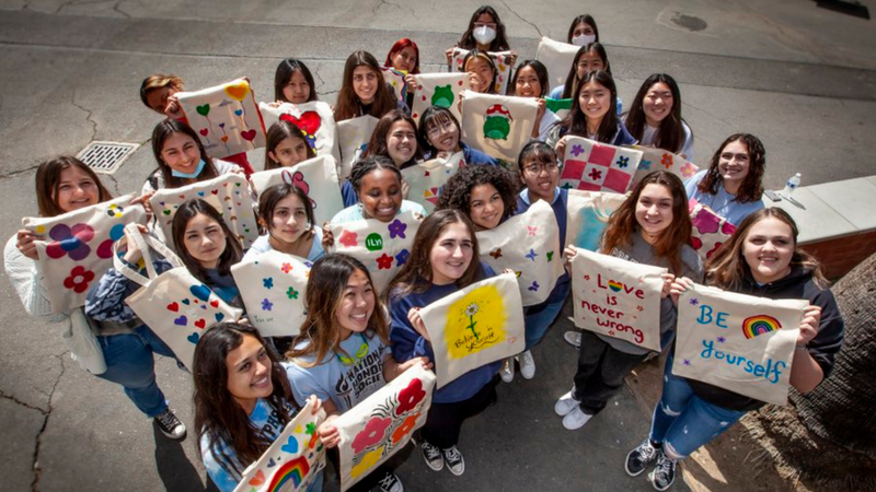 NAMI club at Villa Park High School's latest outreach project - painting tote bags decorated with words of love, hope, and affirmation, to be donated to the LGBTQ Center of Orange County.