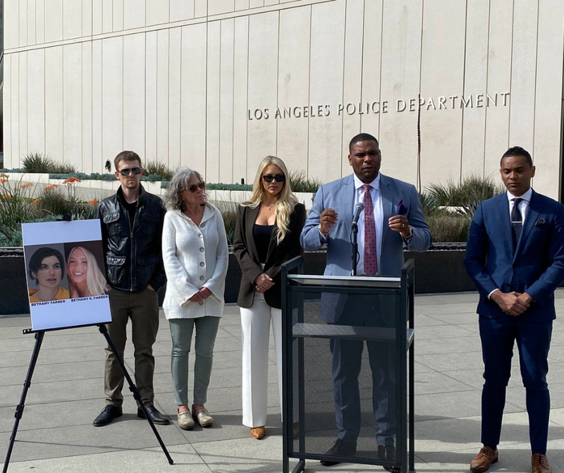 Women and her lawyers outside L.A. LAPD Headquarters