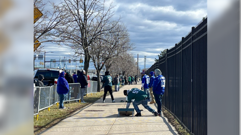 fans tailgating outside Eagles complex