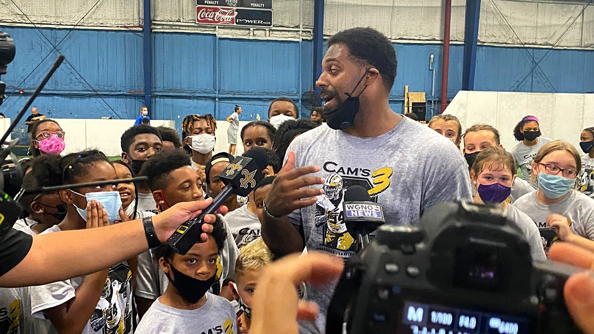 Scenes from Cam Jordan's youth camp: Football, dance breaks and Tank's debut