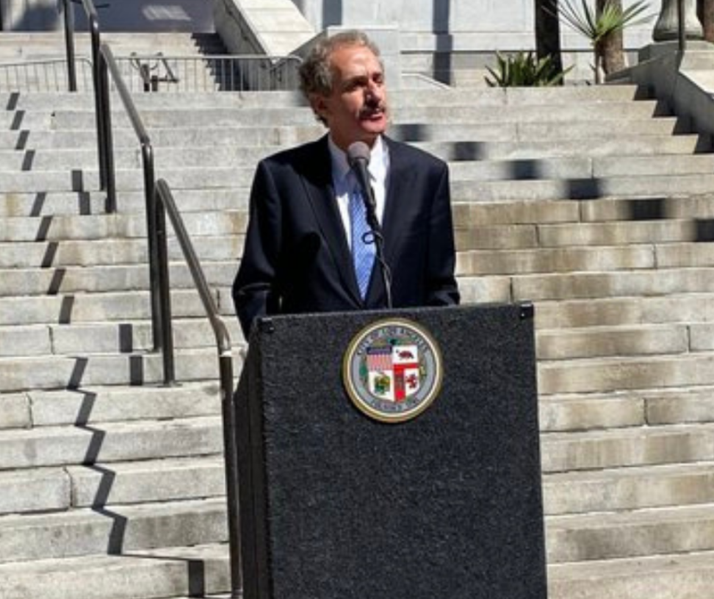 Mike Feuer announcing a lawsuit filed against Monsanto and two other companies for allegedly polluting the City of Los Angeles' waterways with PCBs in a news conference outside City Hall.
