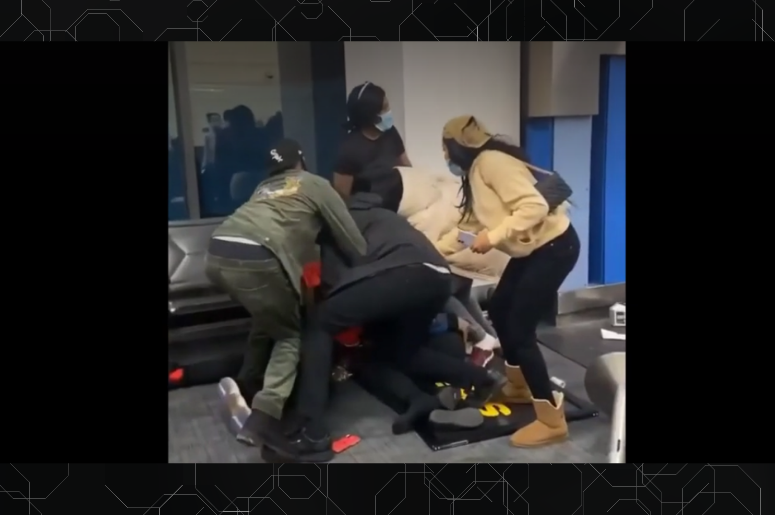 A fight at Detroit Metro Airport left two Spirit Airlines workers hospitalized