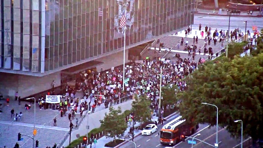 L.A. police clash with protesters downtown, officers citywide on ‘high alert’
