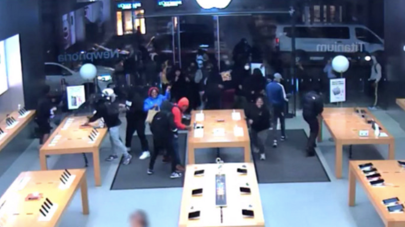 A group forced their way inside an Apple store as employees were trying to leave and stole phones, laptops and tablets.