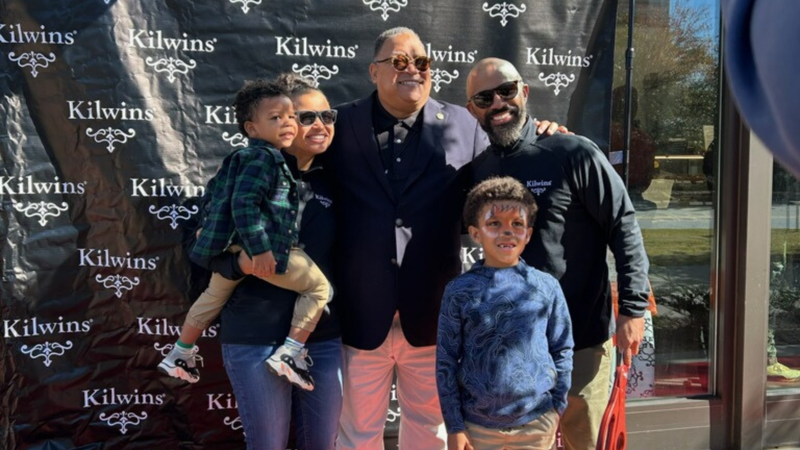 (L TO R) Erika Perry, son, Myles, Julian Bond, Husband Chris Perry and son, Christopher.
