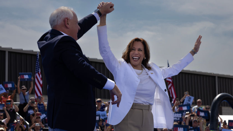 (L To R) "Candidate for Vice President of the United States" Tim Walz "Candidate for President of the United States" Kamala Harris