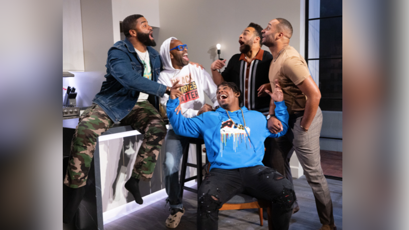 Eric Robinson Jr., Steve H. Broadnax III, Elijah Jones (seated), John Clarence Stewart, and Keith A. Wallace on set. 