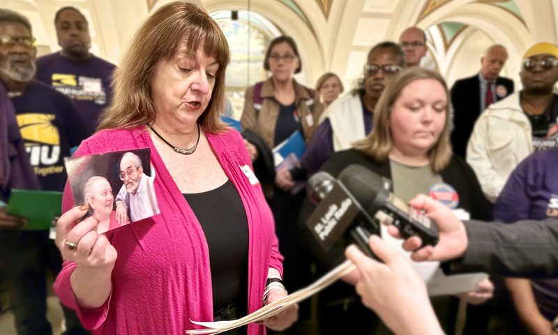 Michelle Gralnick, one of the leaders of Missouri Alliance for Long-Term Care Reform, holds up a photo of her parents, who were hospitalized for sepsis a combined eight times during their nine years in Missouri nursing homes due to poor care.