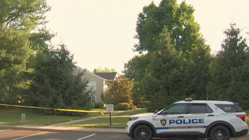 Police car outside the condo where an elderly woman was found dead Sunday