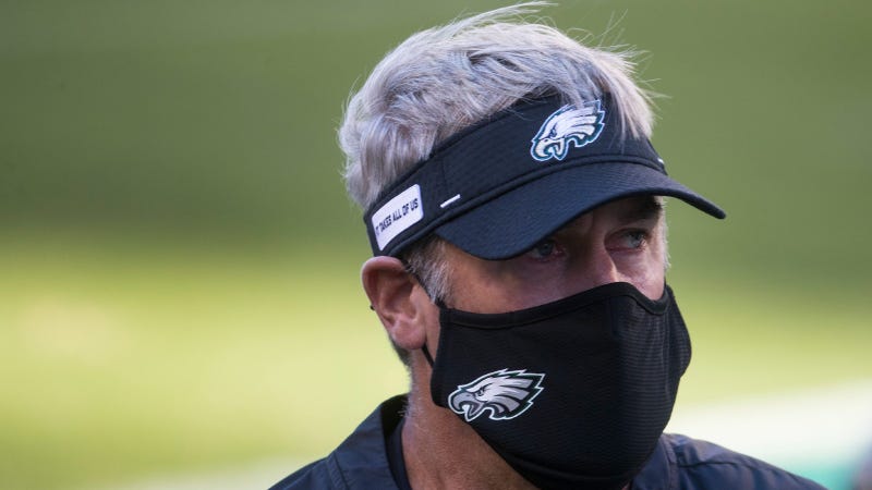 Eagles head coach Doug Pederson walks off the field