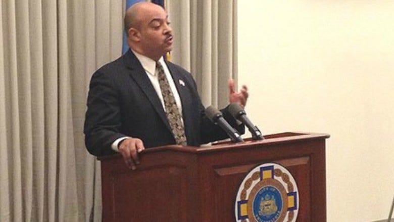 Seth Williams in 2014 at a podium